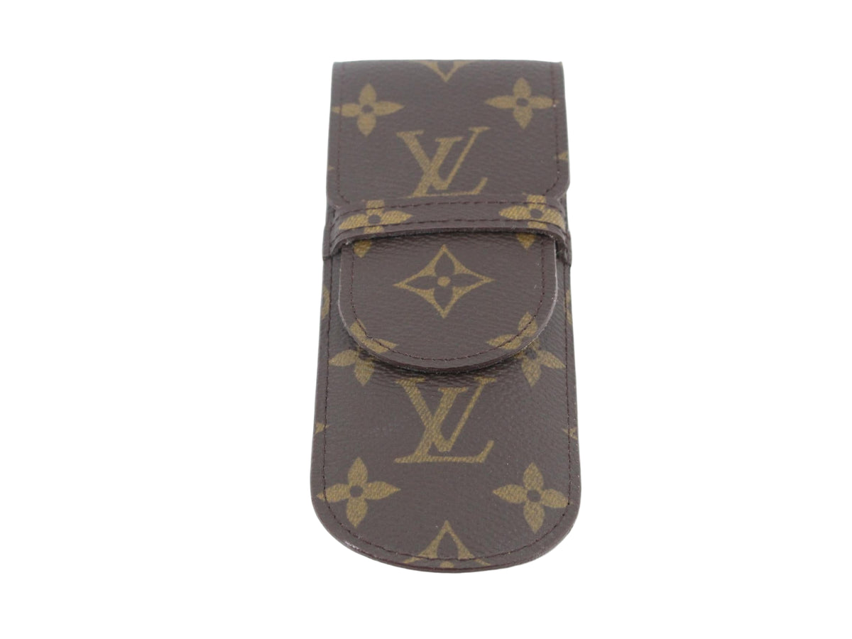 Louis Vuitton monogram patterned pouch on a white background