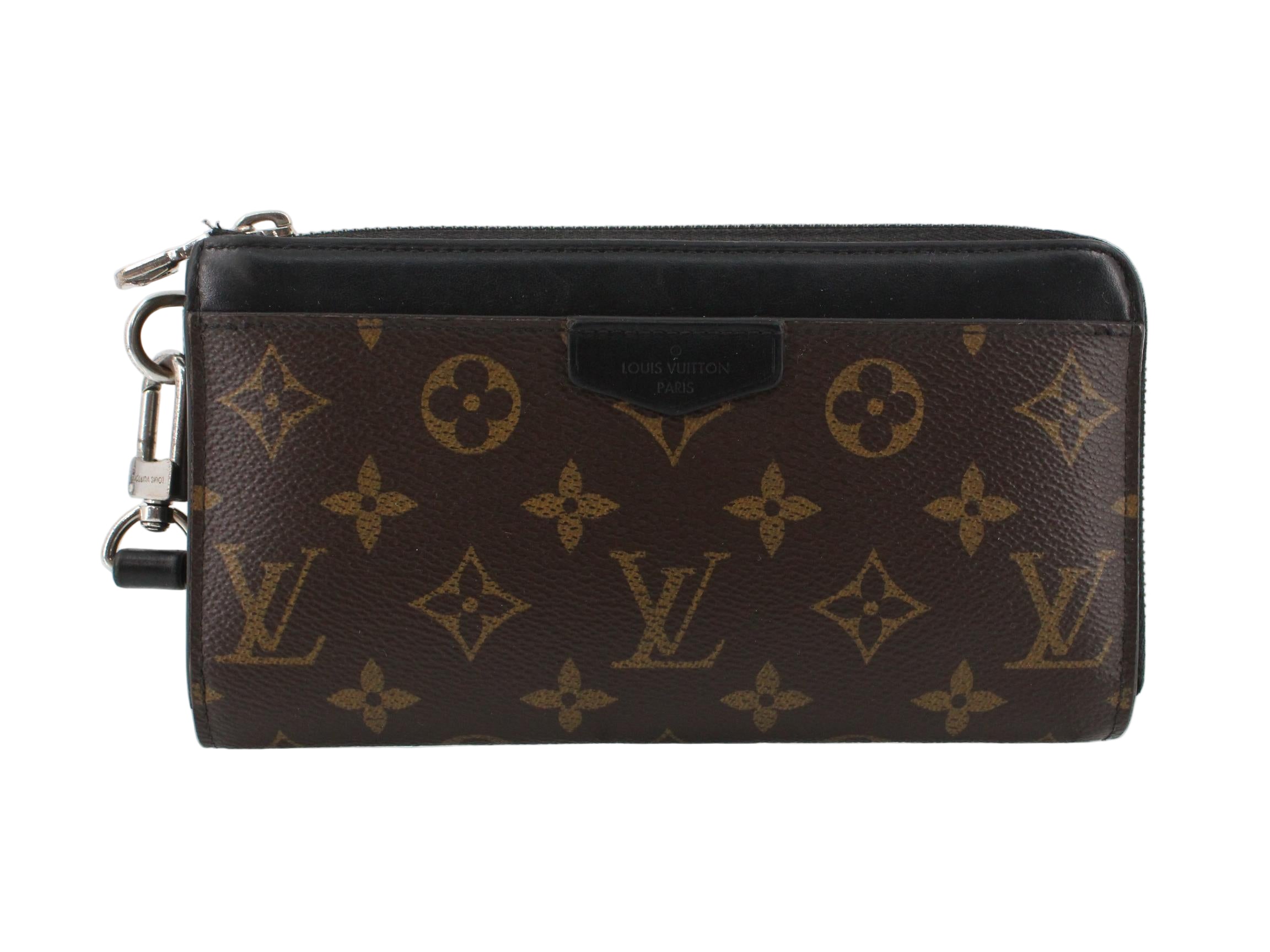 Louis Vuitton wallet with monogram pattern on a white background