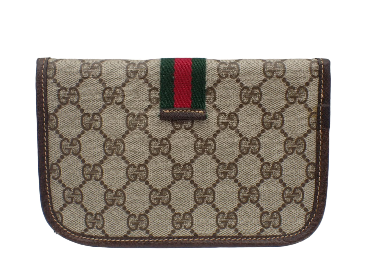 Gucci wallet with monogram pattern and red and green stripe on a light gray background