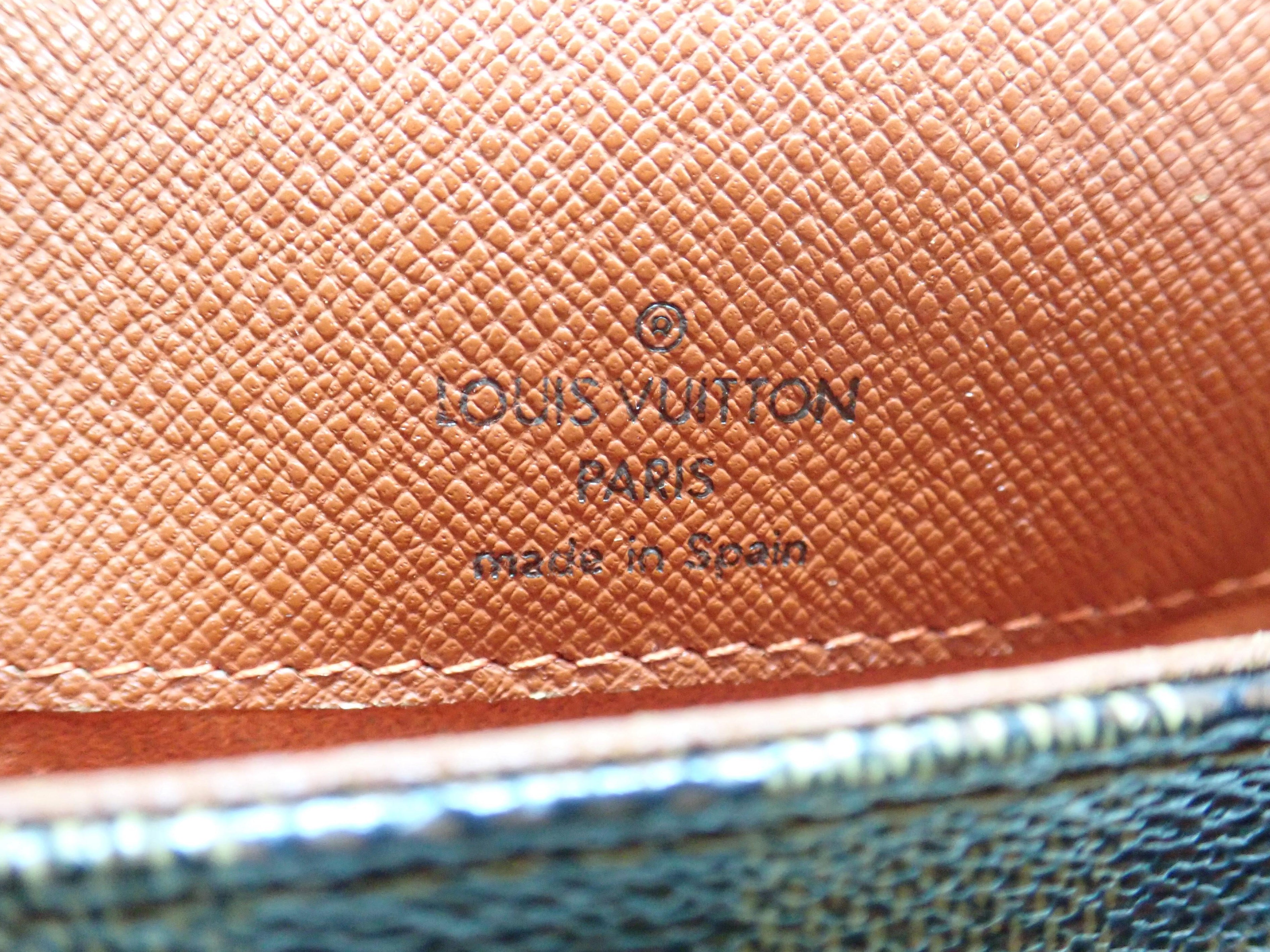 Close-up of a Louis Vuitton bag with visible branding.