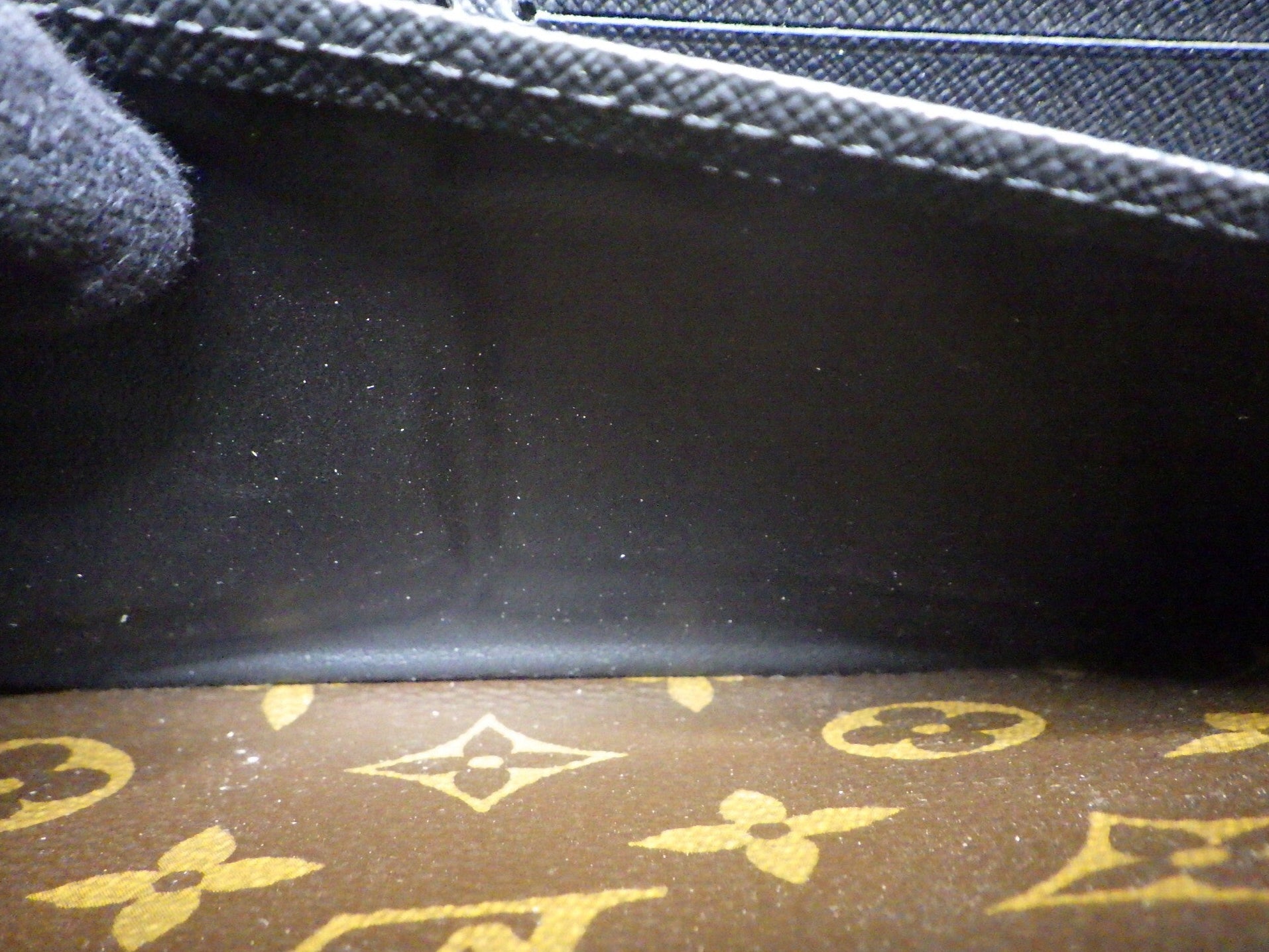 Close-up of a Louis Vuitton bag with monogram pattern
